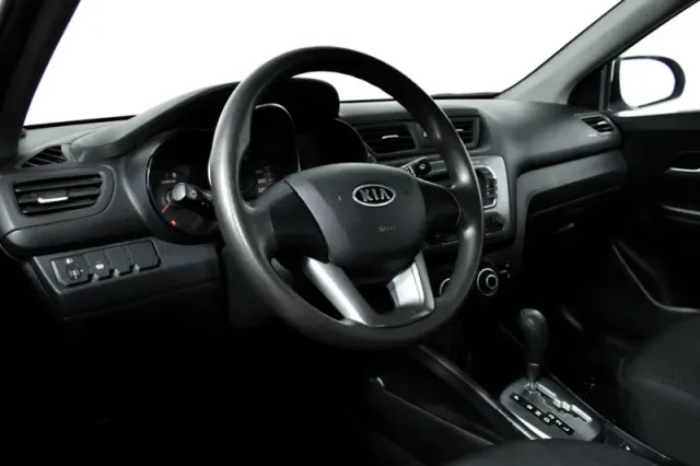 Kia Rio, III — фото 13